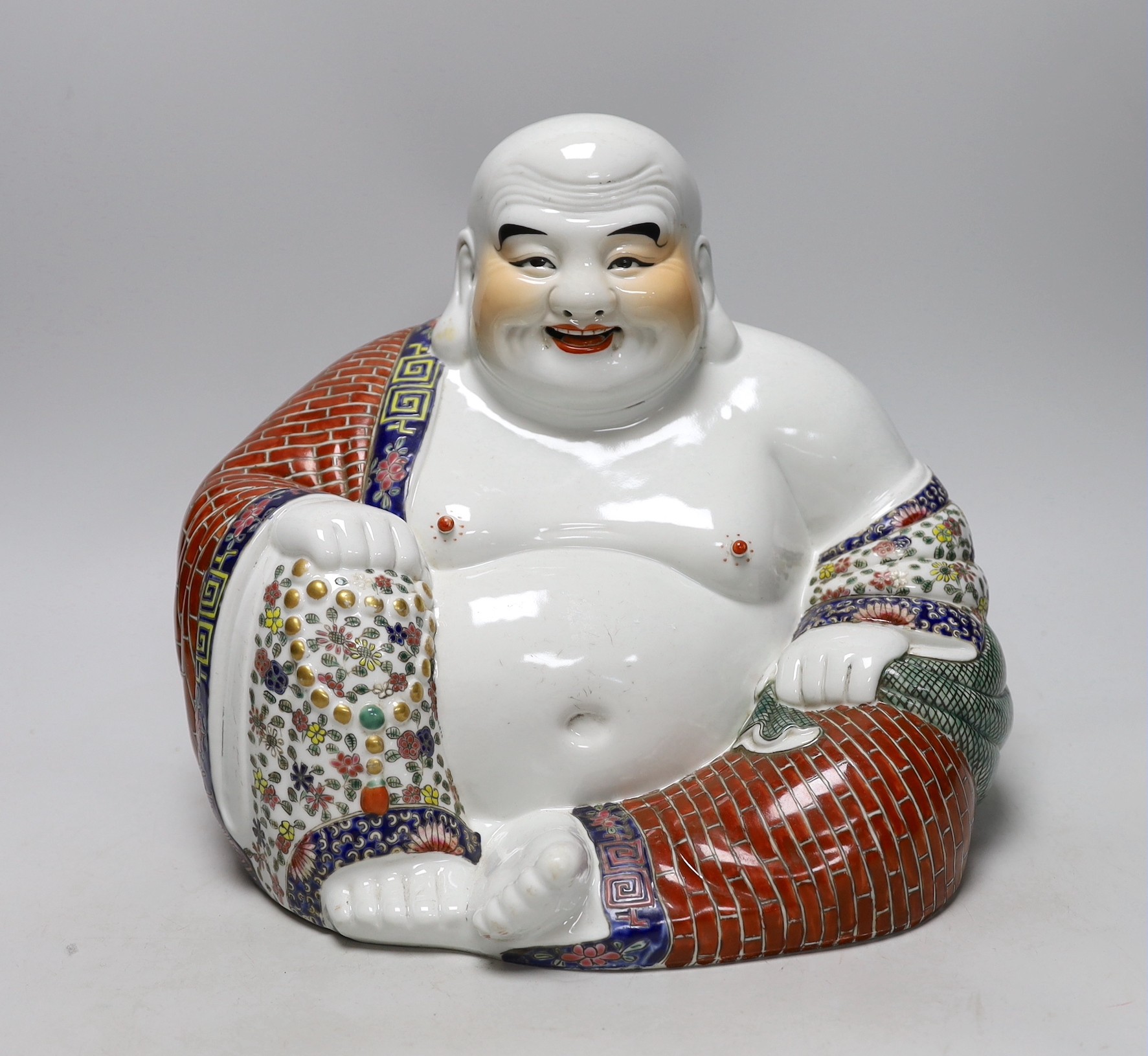 A Chinese ceramic Buddha